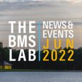 Newsletter banner with the BMS Lab logo on the left and News and events June 2022 on the right, on a backgorund showing the sea at sunset.